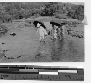 Fr. Edmund Toomey at a stream between Pingnan and Dubang, China, 1932