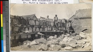 Building a stone, brick, and mud wall, Haizhou, Jiangsu, China, ca.1905-1915