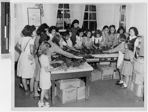 Sister Anastasia, MM, with Girl Scout troop, Kalihi, Honolulu, Hawaii, ca. 1940-1950