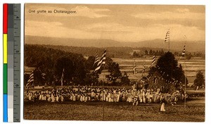 Gathering in a field with flags, Chotanagpur Plateau, India, ca.1920-1940