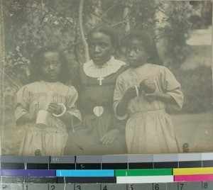 Elisabeth Rabemaso, a teacher, together with two girls from the Girls' School, Antananarivo, Madagascar, ca.1905