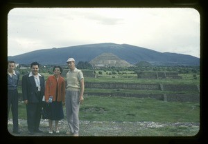 group standing in front of ruins