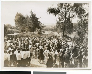 Large crowd of people gathered outdoors, South Africa