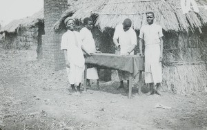 Officers' Boys Ironing, Malawi, ca. 1914-1918