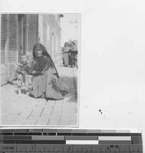 A child entering the orphanage at Fushun, China, 1934