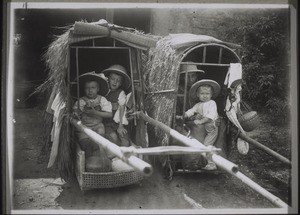 Carrying-chairs made of bamboo with palm-leaf roofs. A way of transporting women and children