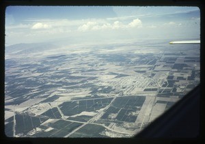 aerial view cultivated fields and mountains