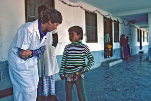 Danish Bangladesh Leprosy Mission/DBLM, 1985. Sister Bente Birkmose Jakobsen in conversation wi