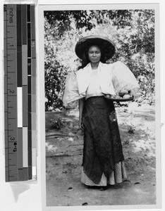 Filipina in traditional dress, Philippines, ca. 1920-1940