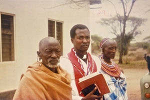 BD Rev. Isak Landei between his Masai parents at the ordination day in Makumira, 1975. Isak Lan