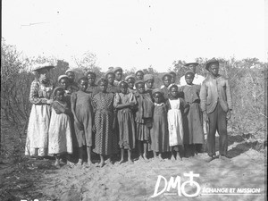 Miss Grand with a group of schoolchildren, Kouroulene, South Africa, ca. 1896-1911