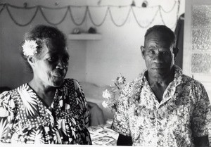 Rev. Drume Passa, the pastor of Chepenehe, with his wife, at their home