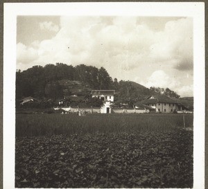 General view of Howan, seen from the south. Above the chapel, on the right the school building and the pastor's house. On the left the living quarters for co-workers etc