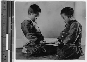 Two Korean boys reading, Chungwha, Korea, 1929