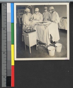 Doctors performing an operation at St. Luke's in Shanghai, China, ca.1925