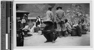 Maryknoll Sisters Lucy and Celeste walking through market, Baguio, Philippines, March 24, 1935