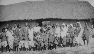 A group of newly baptised Meches (Boros) outside their church in Saragaon