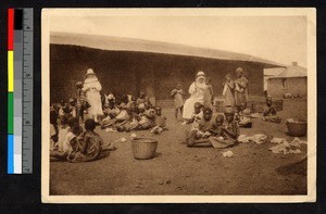 Missionary sisters teaching children to sew, Cameroon, ca.1920