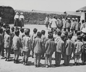 Chinese schoolchildren with three Danish woman missionaries