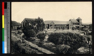 Students standing before brick school, Madagascar, ca.1920-1940