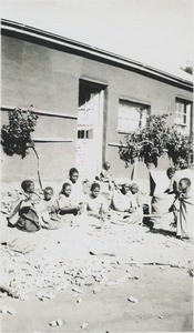 Children shelling corn