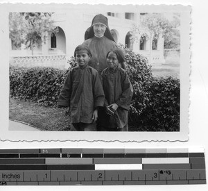 Sister Richard with orphans at Luoding, China, 1937