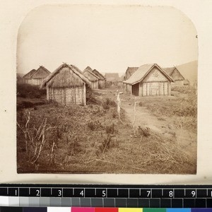 Close-up view of thatched wooden huts in forest village, Madagascar, ca.1865-1885