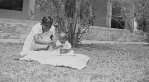 A baby patient at a hospital in India feeded by the staff nurse. The child is rejected by the m