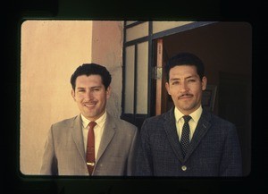 Two men outside a building