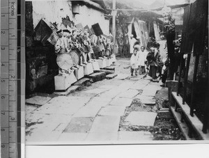 Children and paper figures for funeral, Sichuan, China, ca.1915-1925