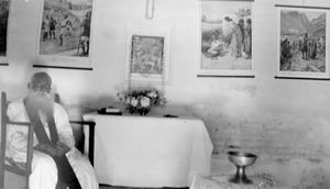 Arcot, South India. The Pastor at the alter of Pennadam Church, 26th April 1931