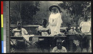 Learning to sew with machines, Congo, ca.1920-1940