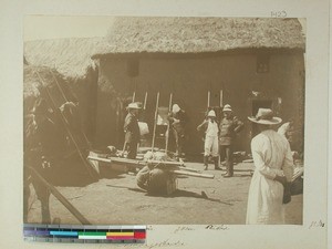 Missionaries stopping for lunch in a little village, Madagascar, 1901