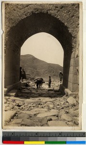 View of mountain through arched gate in wall, Jiangsu, China, ca.1923