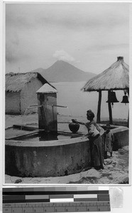 Woman at a well near Lake Atitlan, Guatemala, ca. 1946