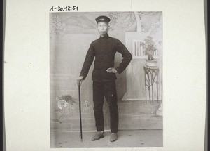 A chinese man dressed wholly in European style