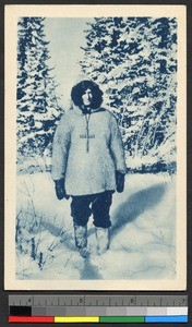 Missionary father standing amid a snowy forest, Canada, ca.1920-1940