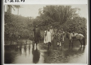 Crossing a river in Bamum