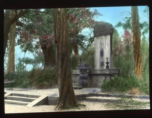 Stone ancestral shrine standing amid trees, China, ca.1917-1923