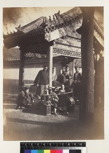 Group portrait of servants and cup mender, Beijing, China, ca. 1861-1864