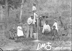 Man and children at the well, South Africa, ca. 1896-1911