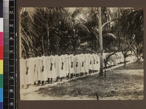 Group of Girls' School students walking to class, Beru, Kiribati, 1913-1914