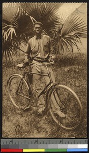 Older student with bicycle, Kinshasa, Congo, ca.1920-1940