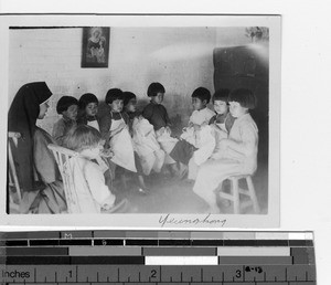 Maryknoll Sister teaching blind girls to sew at Yangjiang, China, 1940