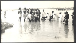 Group baptism in river, India, ca. 1930