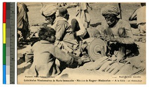 Male grinders at a fair, Nagpur, India, ca.1920-1940