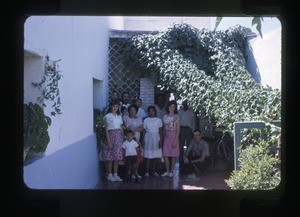 Family outside their home