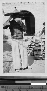 Man eating from bowl in Loting, China, ca. 1933