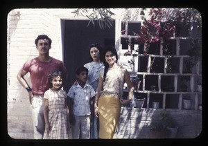 Family outside their home