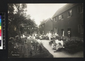 Group outside buildings of Ambohipotsy College, Madagascar, ca. 1930